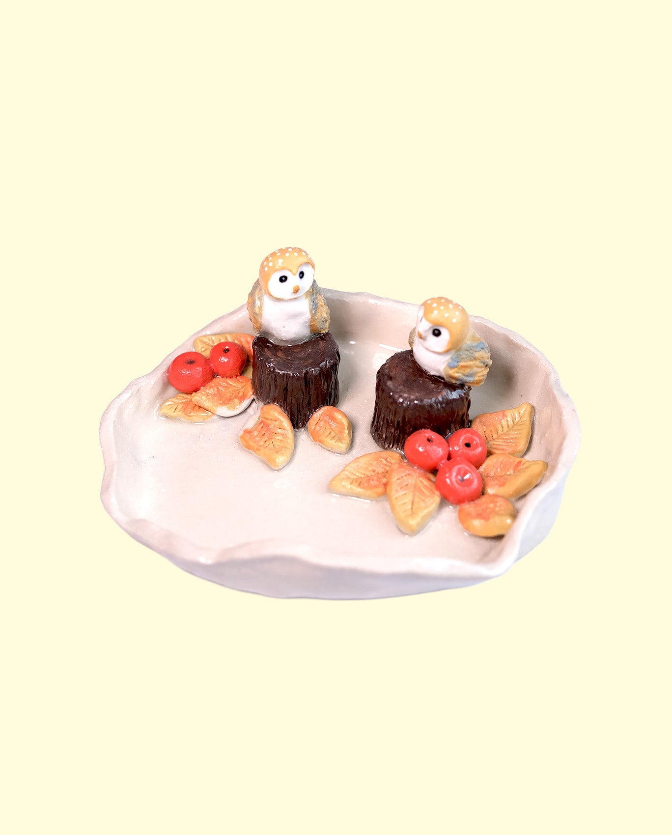 Owls on Tree Stumps