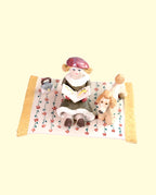 Woman reading to her Poodle